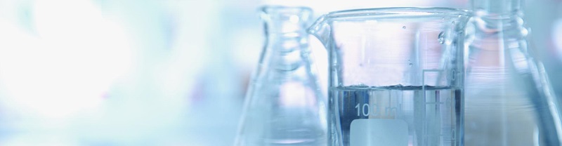 experiment water in beaker and flask in blue chemistry science laboratory background